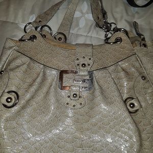 Guess huge purse.